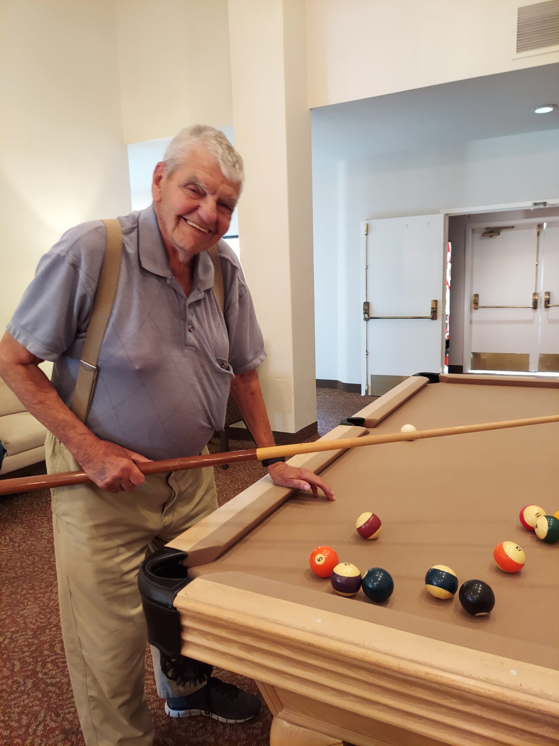 Resident-playing-billiards_El-Cajon-scal